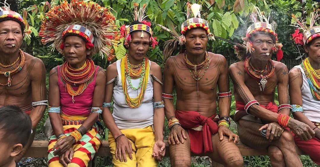 Mentawai community members gathered outdoors
